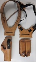 An interchangeable Shoulder Holster that can be used for firearms or AirSoft replicas